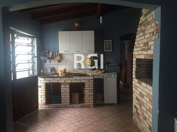 Casa à Venda – 320m², 3 Dormitórios (1 Suíte), 5 Vagas – Partenon