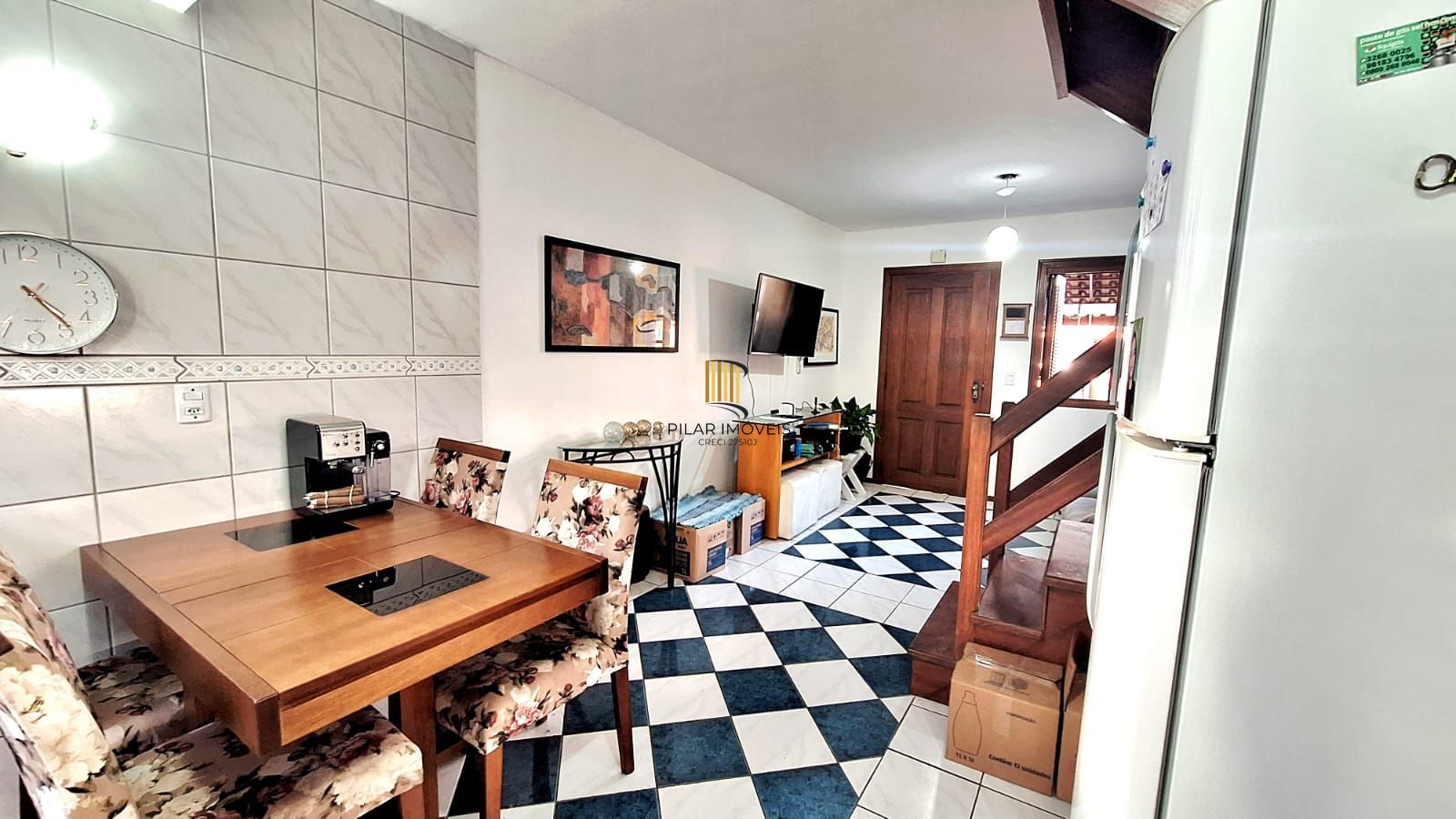 Casa com 2 dormitórios, 1 vaga, na Av. Otto Niemeyer, bairro Camaquã, Poa, RS