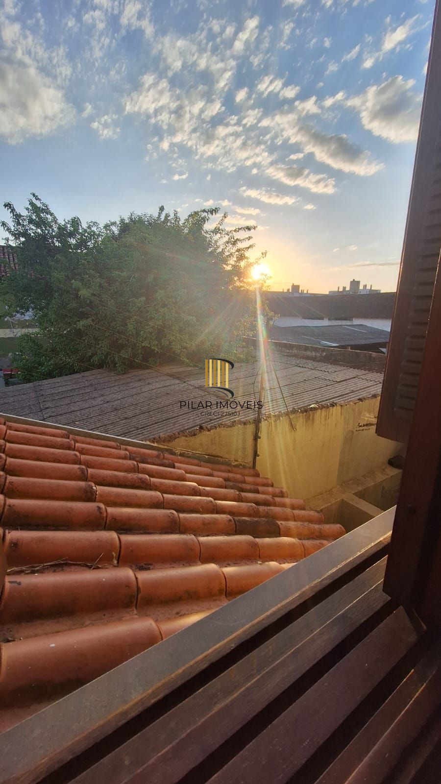 Casa com 2 dormitórios, 1 vaga, na Av. Otto Niemeyer, bairro Camaquã, Poa, RS