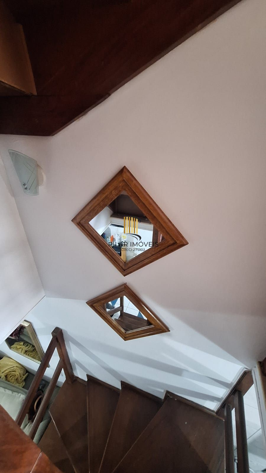 Casa com 2 dormitórios, 1 vaga, na Av. Otto Niemeyer, bairro Camaquã, Poa, RS