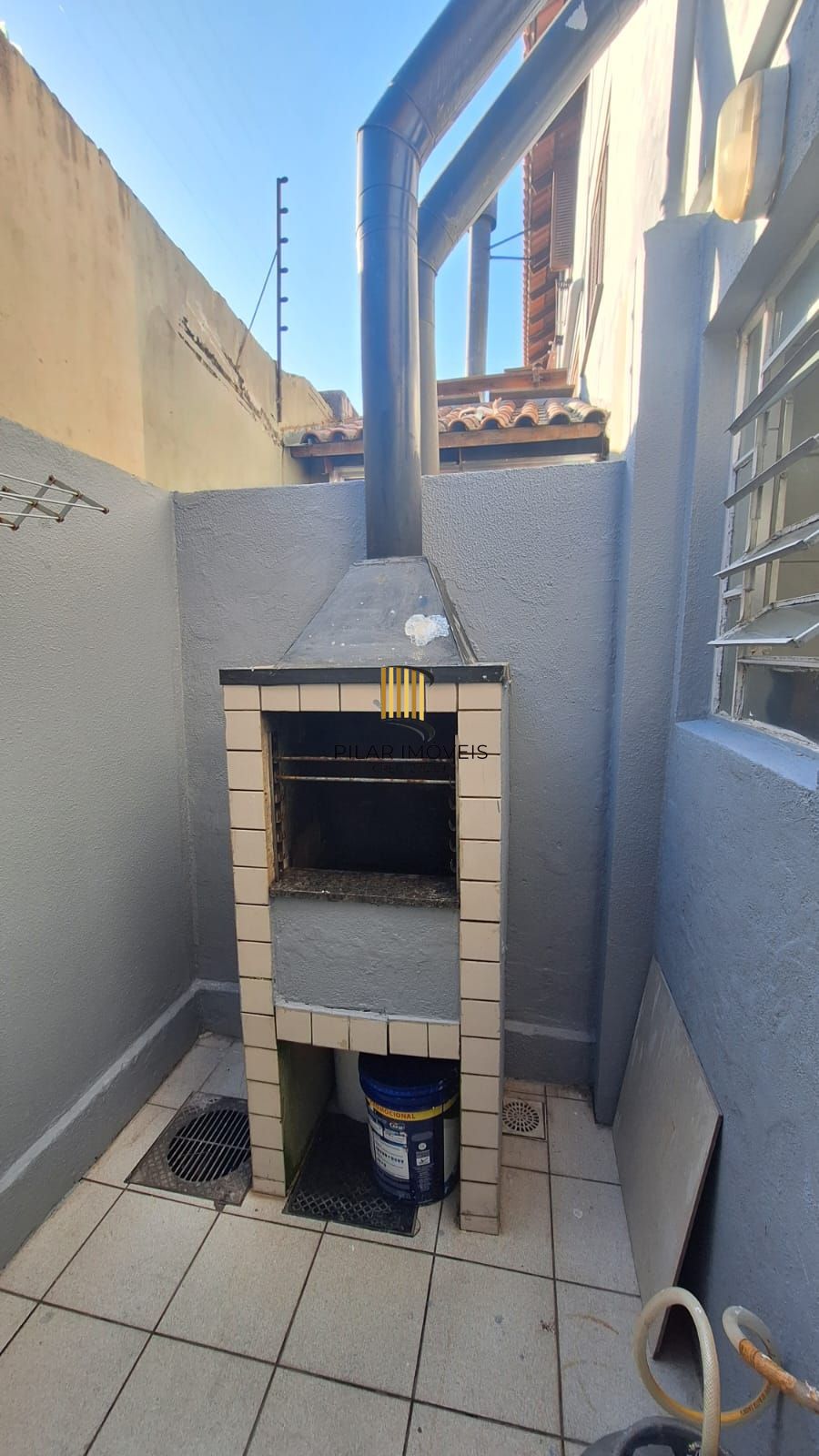 Casa com 2 dormitórios, 1 vaga, na Av. Otto Niemeyer, bairro Camaquã, Poa, RS