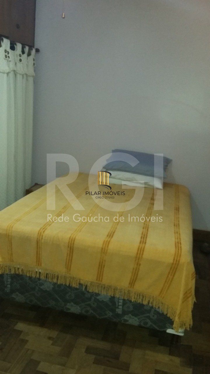 Casa com 4 quartos, 4 banheiros  e amplo pátio no miolo do bairro Cidade Baixa!