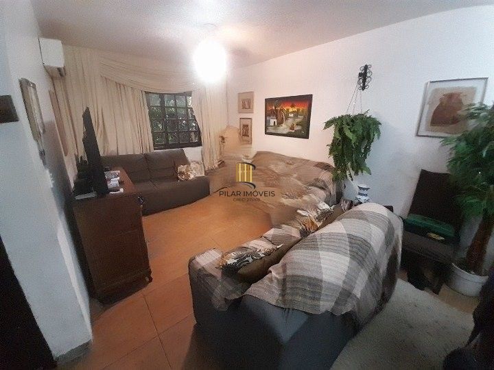 Casa 3 dormitórios para venda no bairro Hípica Condomínio Jardins do Prado.