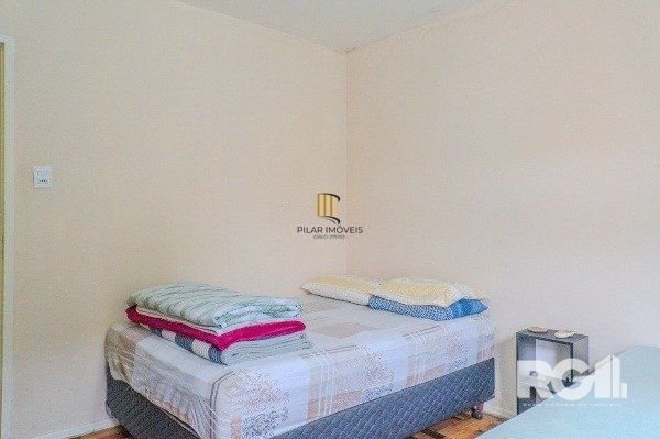 Apartamento com 1 quarto e 47m² à venda em Medianeira, Porto Alegre.