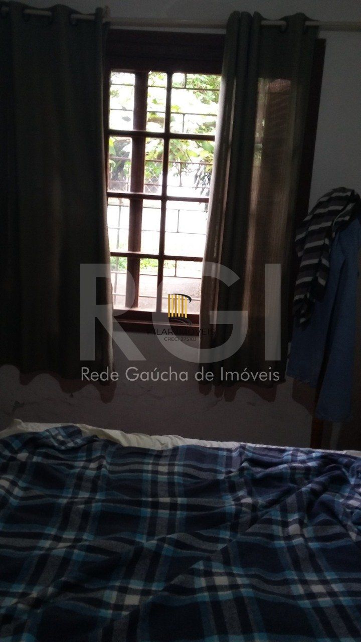 Casa com 4 quartos, 4 banheiros  e amplo pátio no miolo do bairro Cidade Baixa!