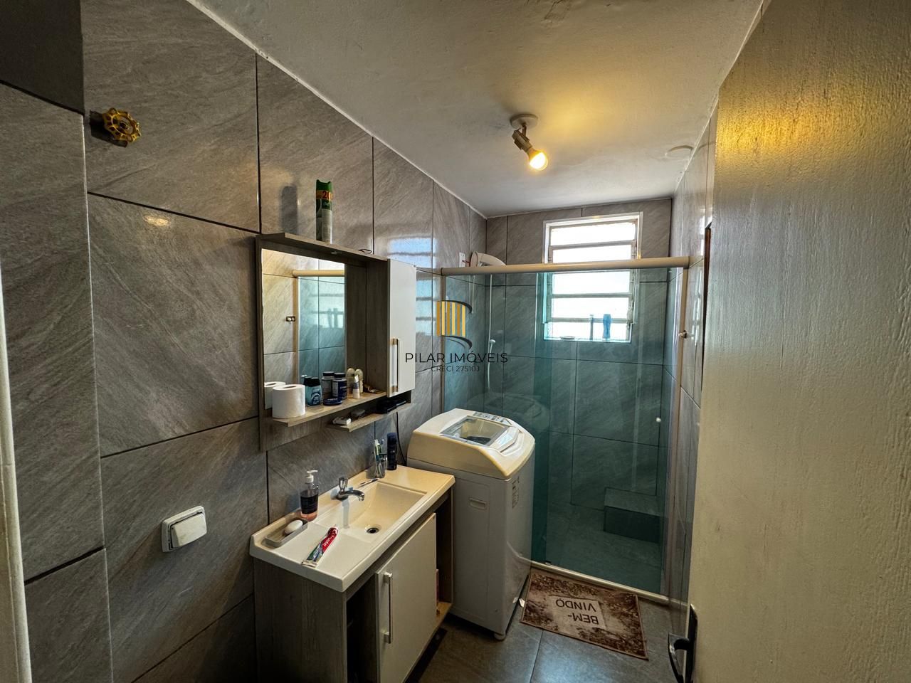 Apartamento de 2 dormitórios, fundos, andar alto.