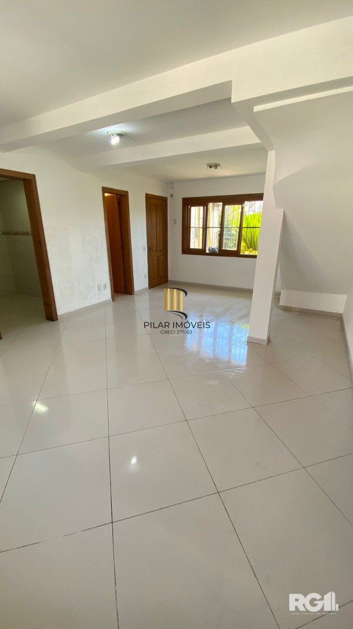 Casa à venda na Rua Martinho Lutero, localizada no bairro Harmonia em Canoas, RS.