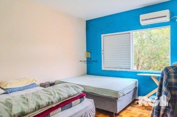Apartamento com 1 quarto e 47m² à venda em Medianeira, Porto Alegre.