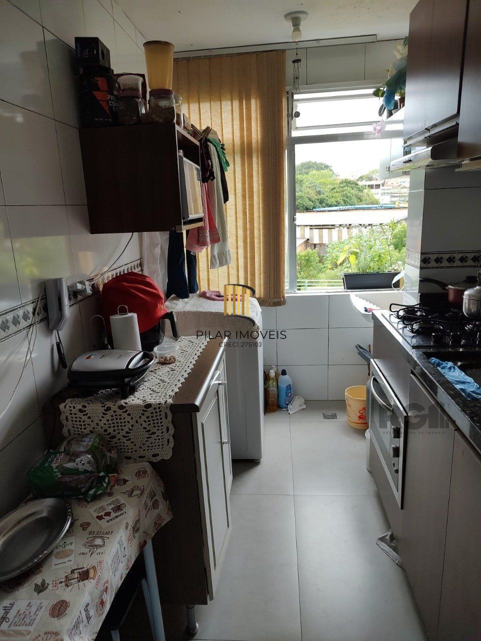 Ótimo apartamento 2 dormitórios de fundos, com garagem, bairro Cavalhada-Porto A