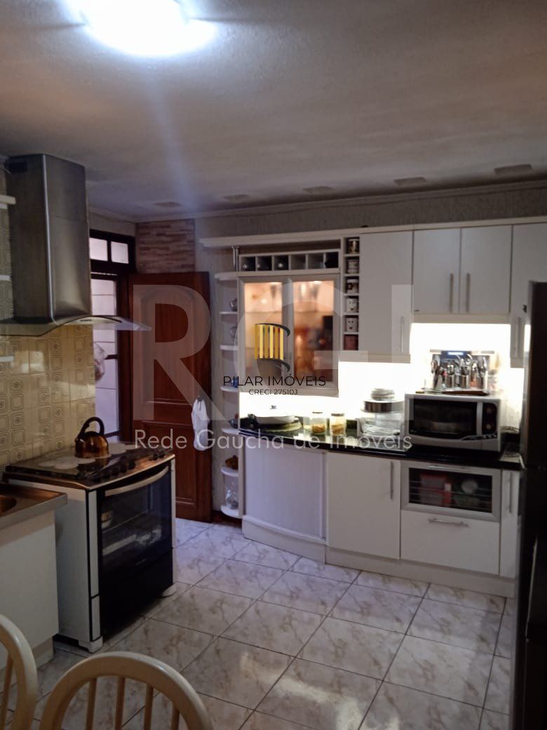 Casa para Venda - 750m², 6 dormitórios, sendo 3 suites, 4 vagas - Partenon