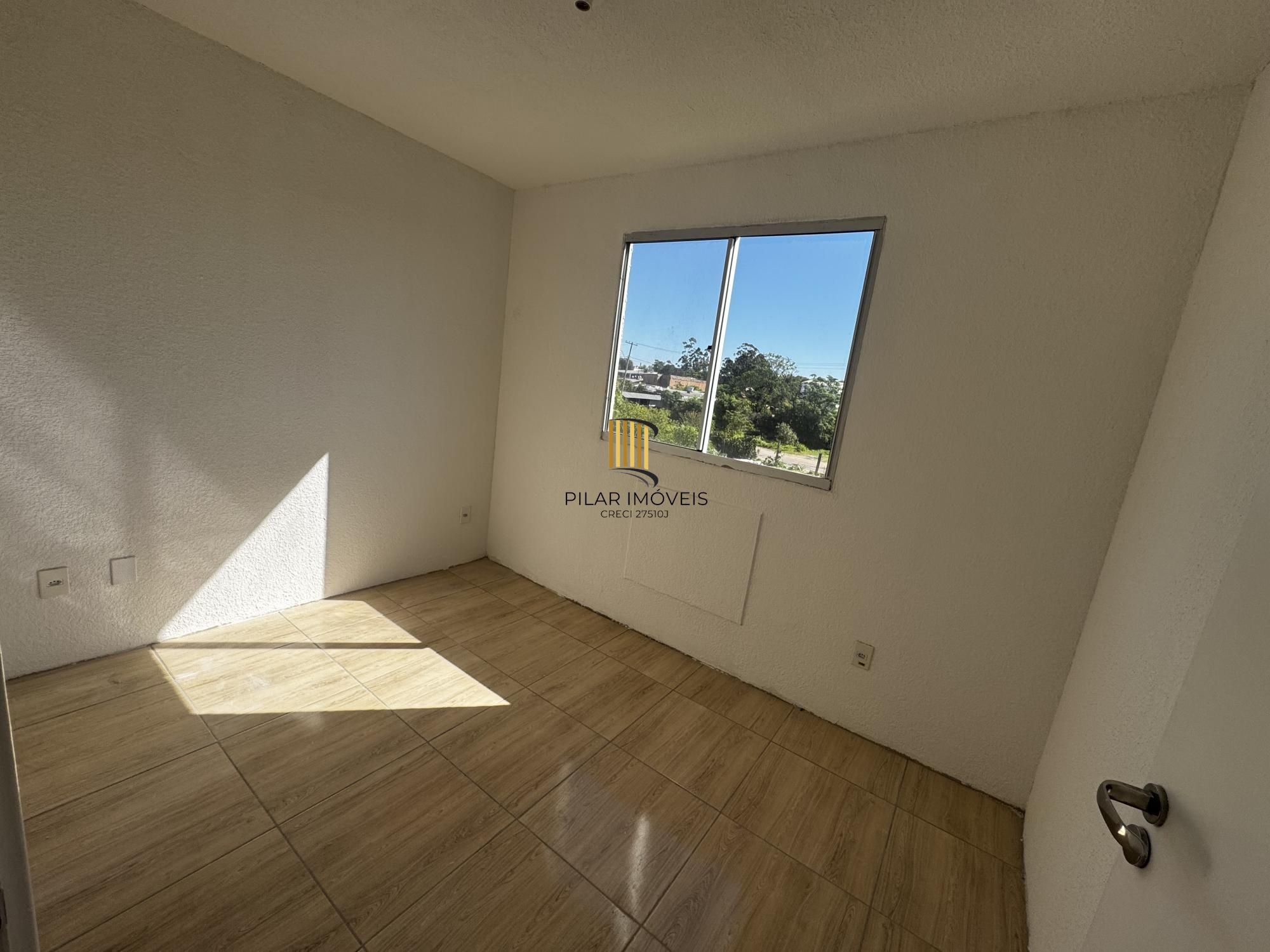 Apartamento de 2 dormitórios com garagem