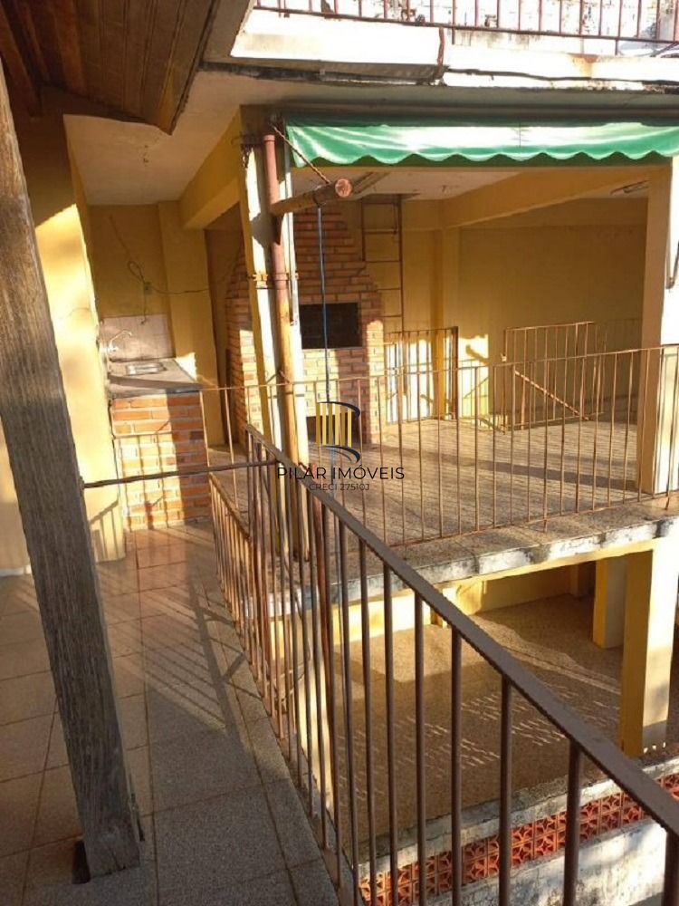 Casa 4 dormitórios, com sacada e amplo terraço - Pilar Imóveis