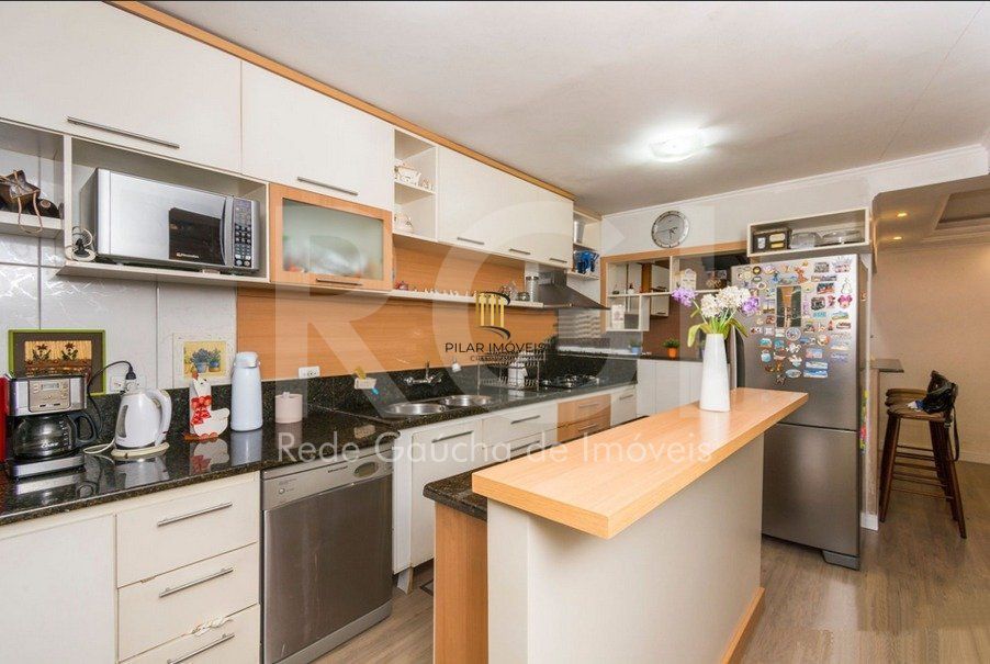 Casa 3 dormitórios à venda Menino Deus Porto Alegre/RS