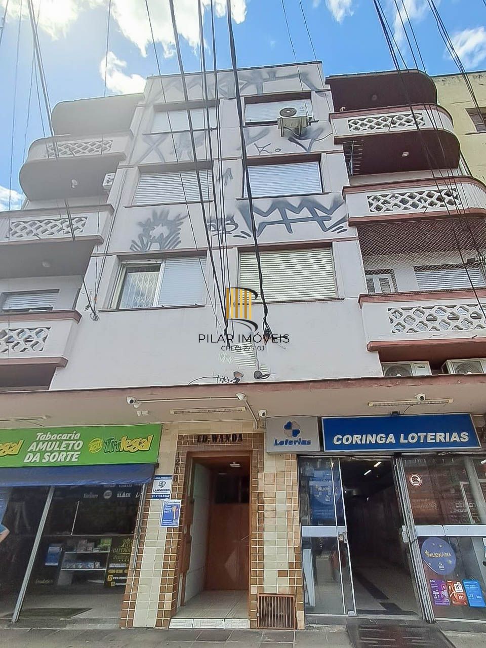 JK mobiliado à venda na Av. Azenha – Porto Alegre, pronto para morar