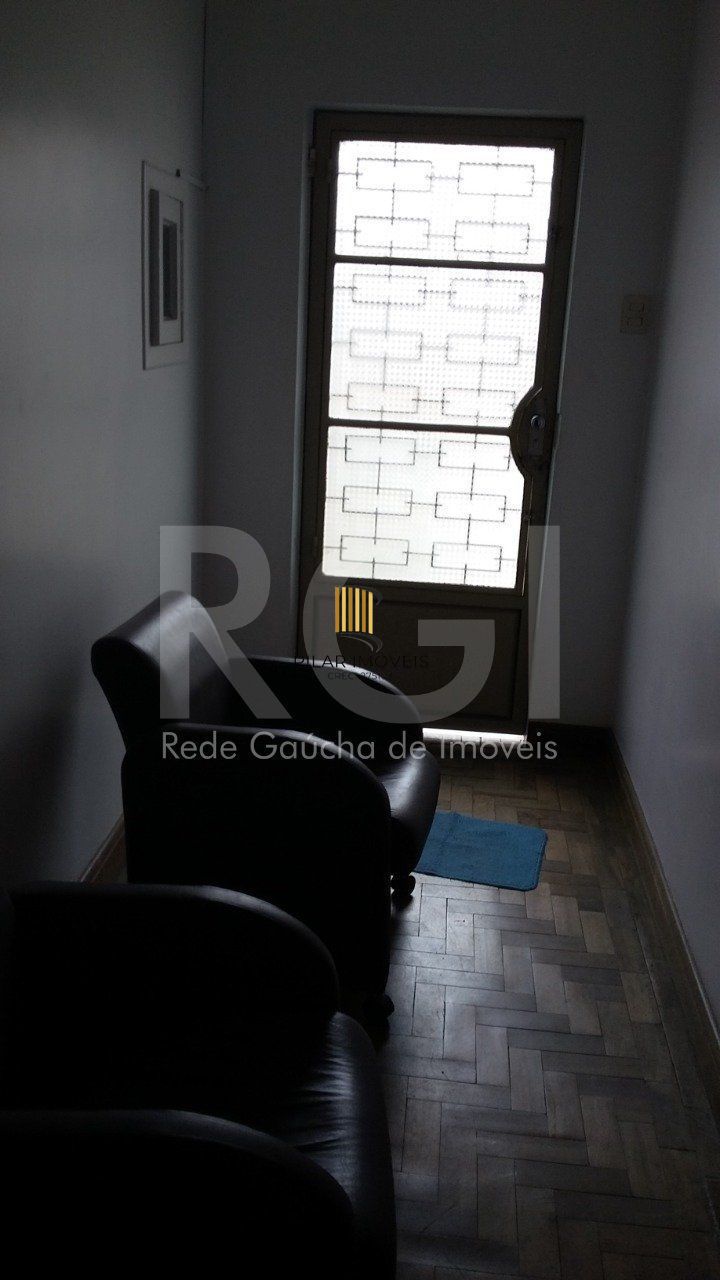 Casa com 4 quartos, 4 banheiros  e amplo pátio no miolo do bairro Cidade Baixa!