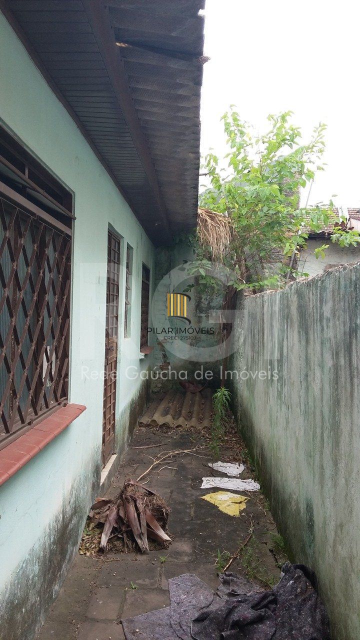 Casa com 4 quartos, 4 banheiros  e amplo pátio no miolo do bairro Cidade Baixa!