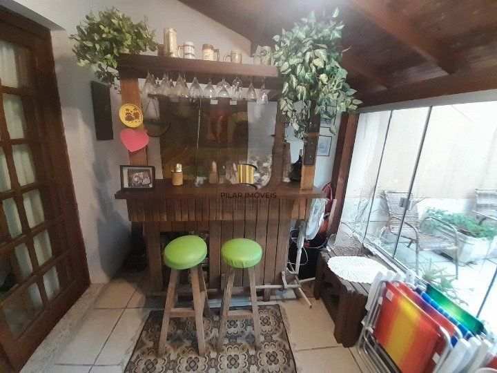 Casa 3 dormitórios para venda no bairro Hípica Condomínio Jardins do Prado.