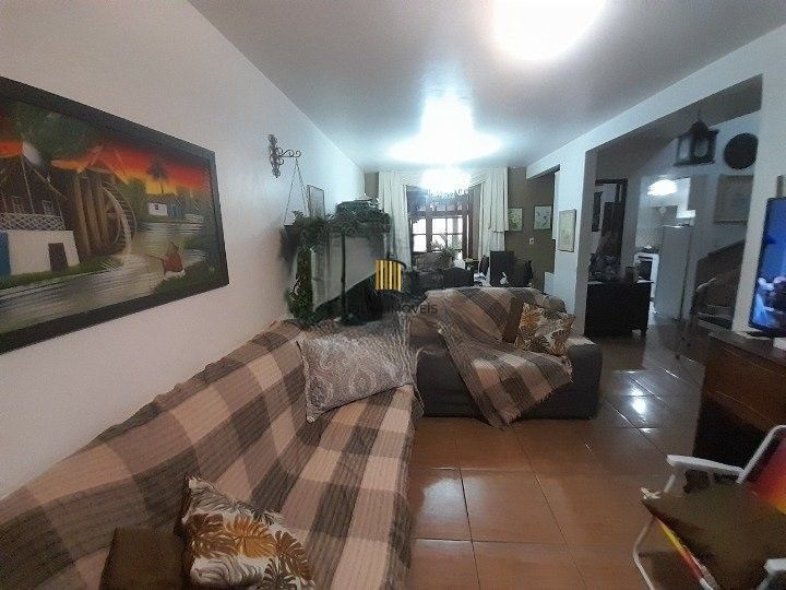Casa 3 dormitórios para venda no bairro Hípica Condomínio Jardins do Prado.