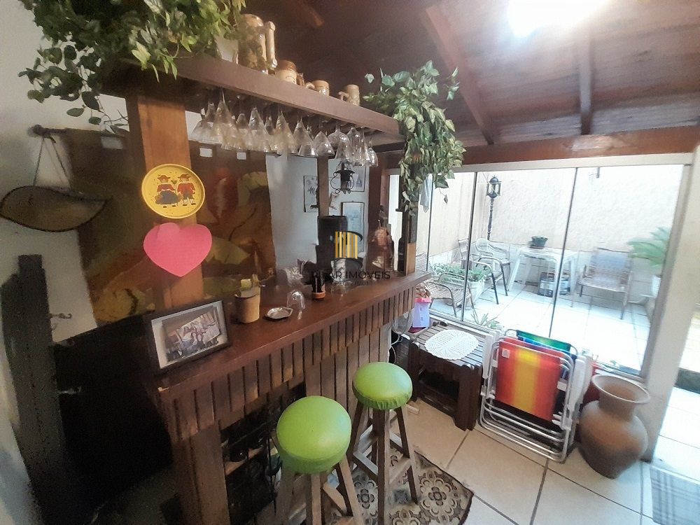 Casa 3 dormitórios para venda no bairro Hípica Condomínio Jardins do Prado.