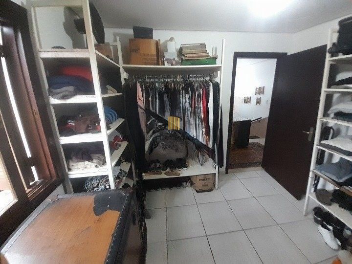 Casa 3 dormitórios para venda no bairro Hípica Condomínio Jardins do Prado.