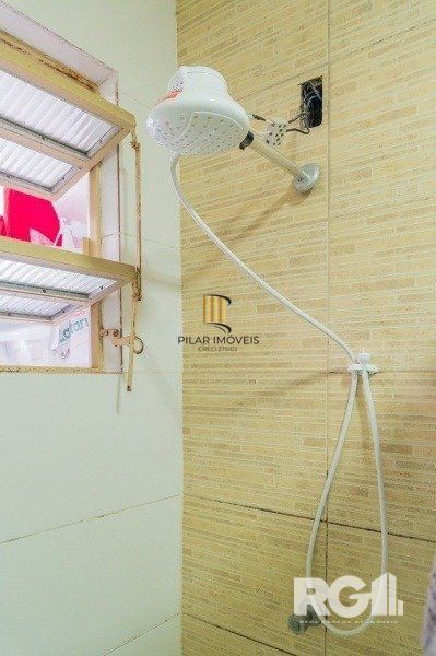 Apartamento com 1 quarto e 47m² à venda em Medianeira, Porto Alegre.