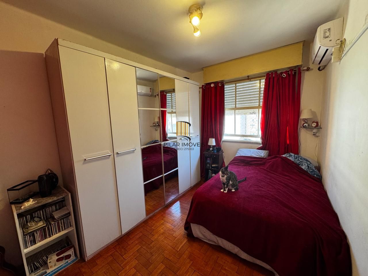 Apartamento de 2 dormitórios, fundos, andar alto.