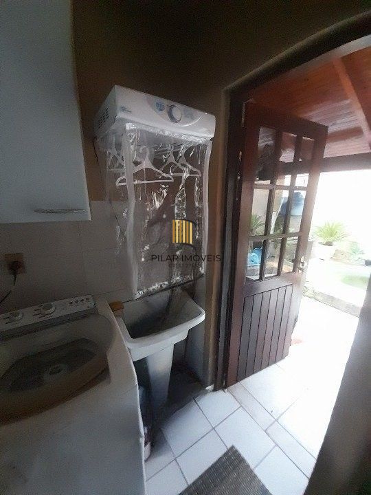 Casa 3 dormitórios para venda no bairro Hípica Condomínio Jardins do Prado.