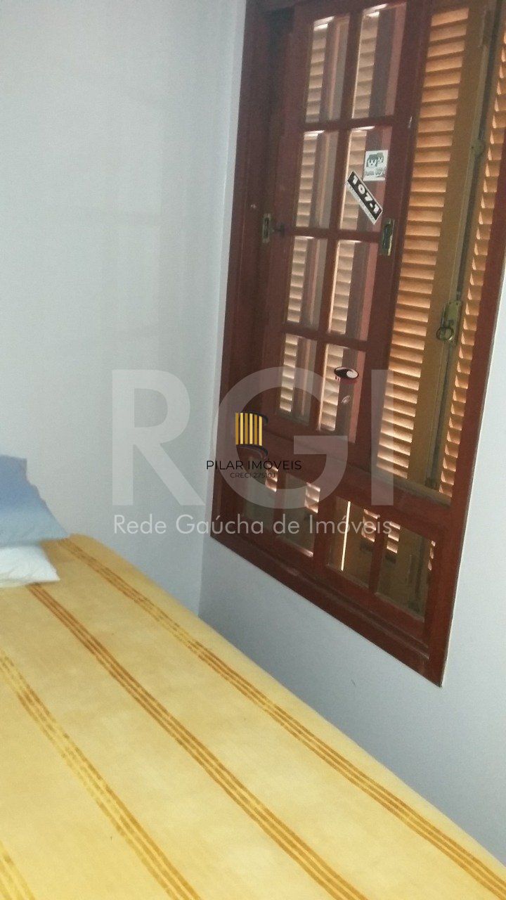 Casa com 4 quartos, 4 banheiros  e amplo pátio no miolo do bairro Cidade Baixa!