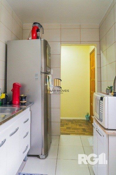 Apartamento com 1 quarto e 47m² à venda em Medianeira, Porto Alegre.
