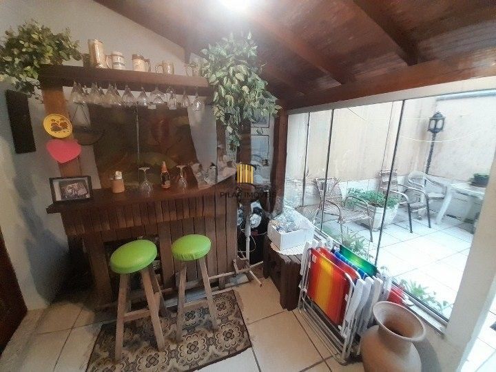 Casa 3 dormitórios para venda no bairro Hípica Condomínio Jardins do Prado.