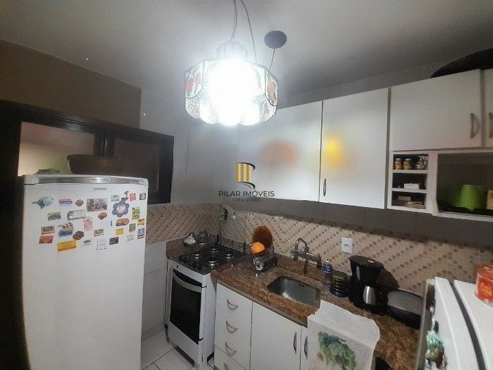 Casa 3 dormitórios para venda no bairro Hípica Condomínio Jardins do Prado.