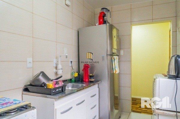 Apartamento com 1 quarto e 47m² à venda em Medianeira, Porto Alegre.