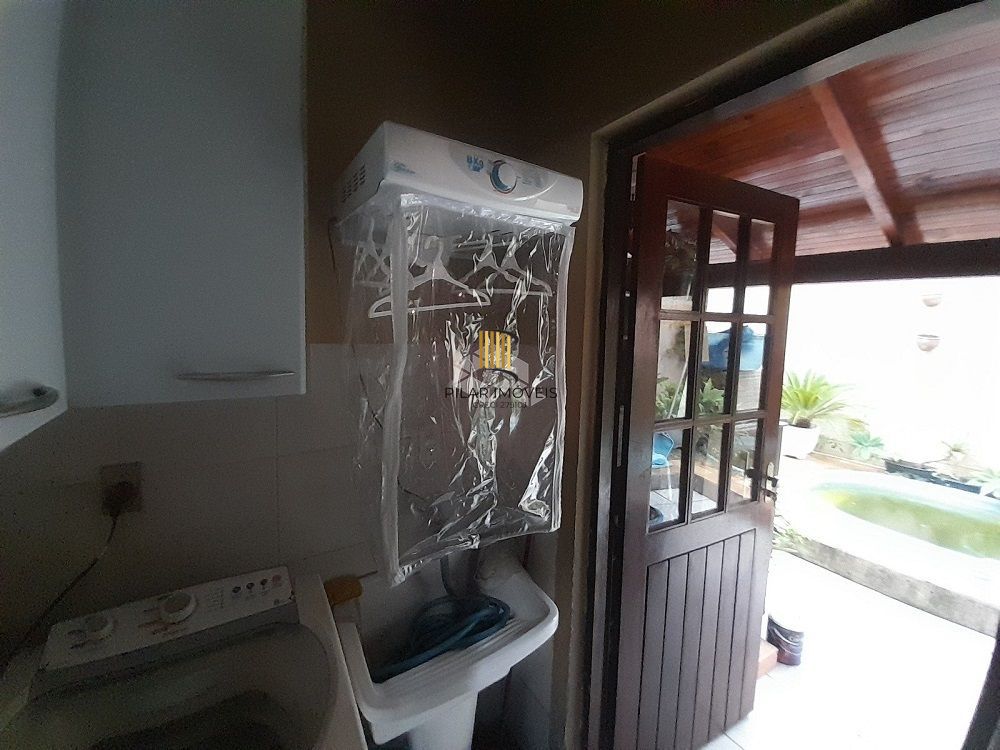 Casa 3 dormitórios para venda no bairro Hípica Condomínio Jardins do Prado.