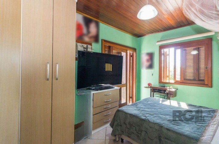 Casa de Condomínio 3 dormitórios no bairro Morro Santana