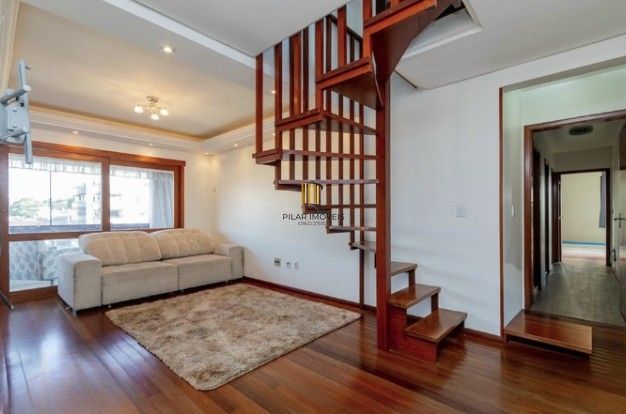 Linda cobertura de 4 dormitórios,1 suíte , 4 banheiros para venda, 4 vagas de garagens cobertas e escrituradas, 1 terraço com deck, piscina e churrasqueira no bairro Jardim Lindóia em Porto Alegre/RS. - Pilar Imóveis