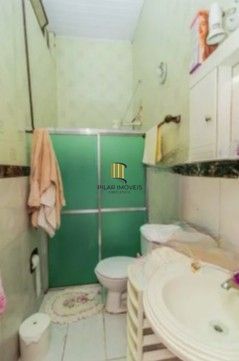 Casa para Venda - 308m², 3 dormitórios, sendo 1 suites, 2 vagas - Coronel Aparício Borges