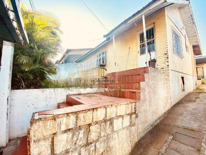 CASA BAIRRO CAMAQUÃ COM 4 DORMITORIOS