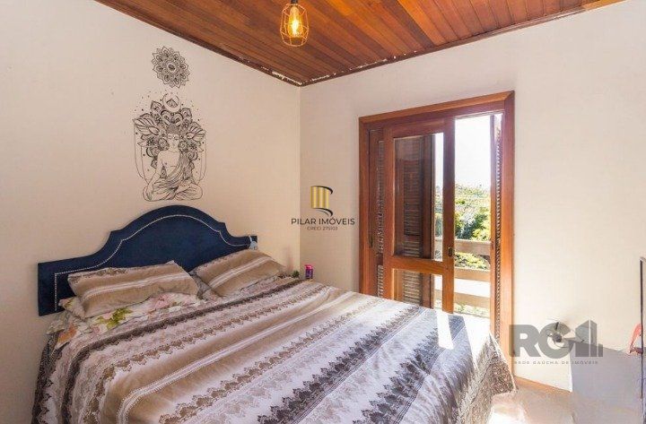 Casa de Condomínio 3 dormitórios no bairro Morro Santana