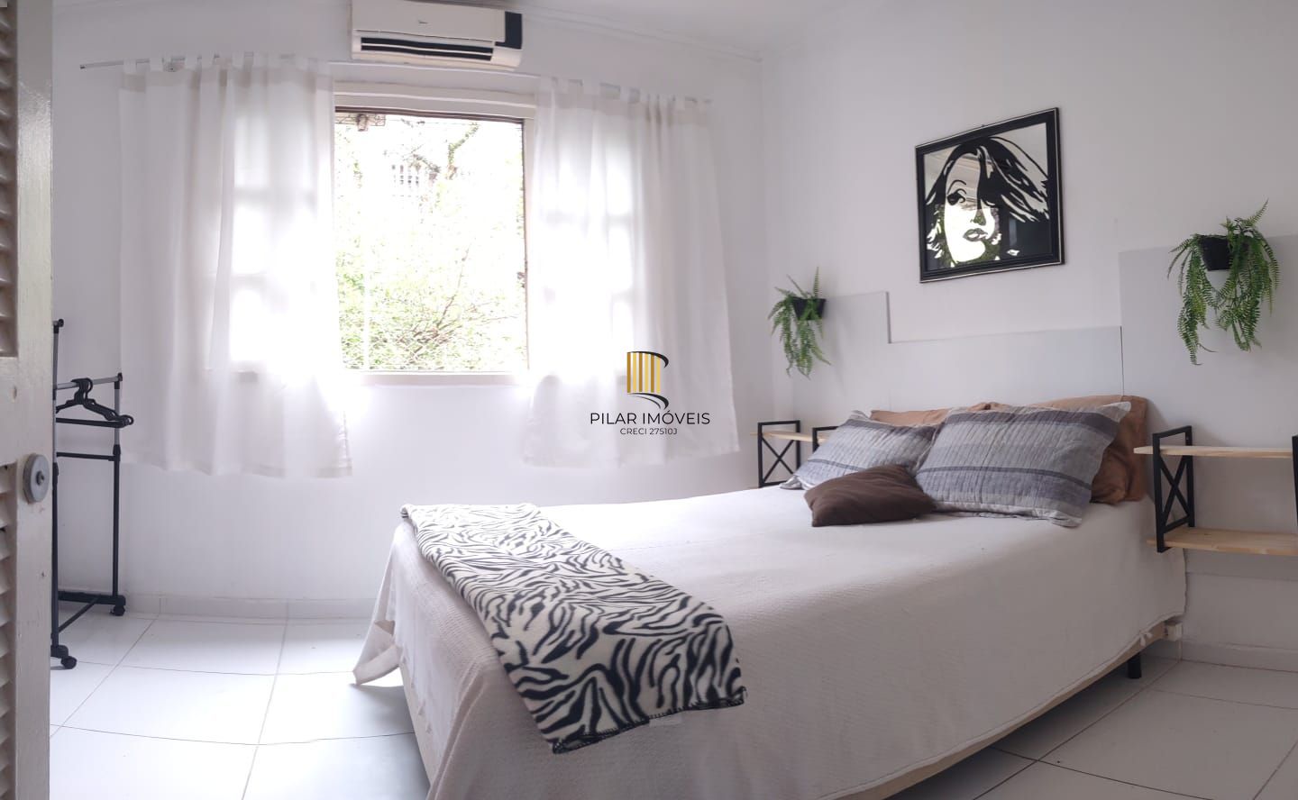 Apartamento de 2 dormitórios com vaga na cidade baixa