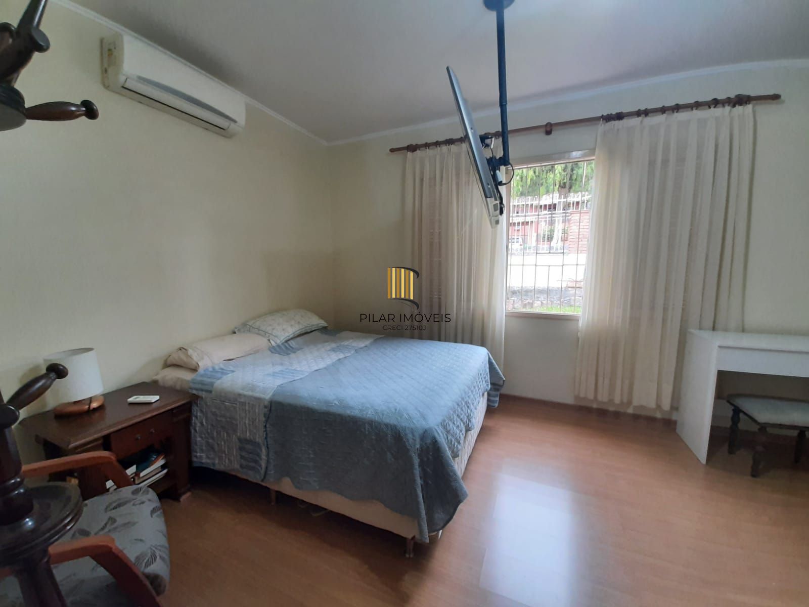 Casa 4 dormitórios no bairro Nonoai