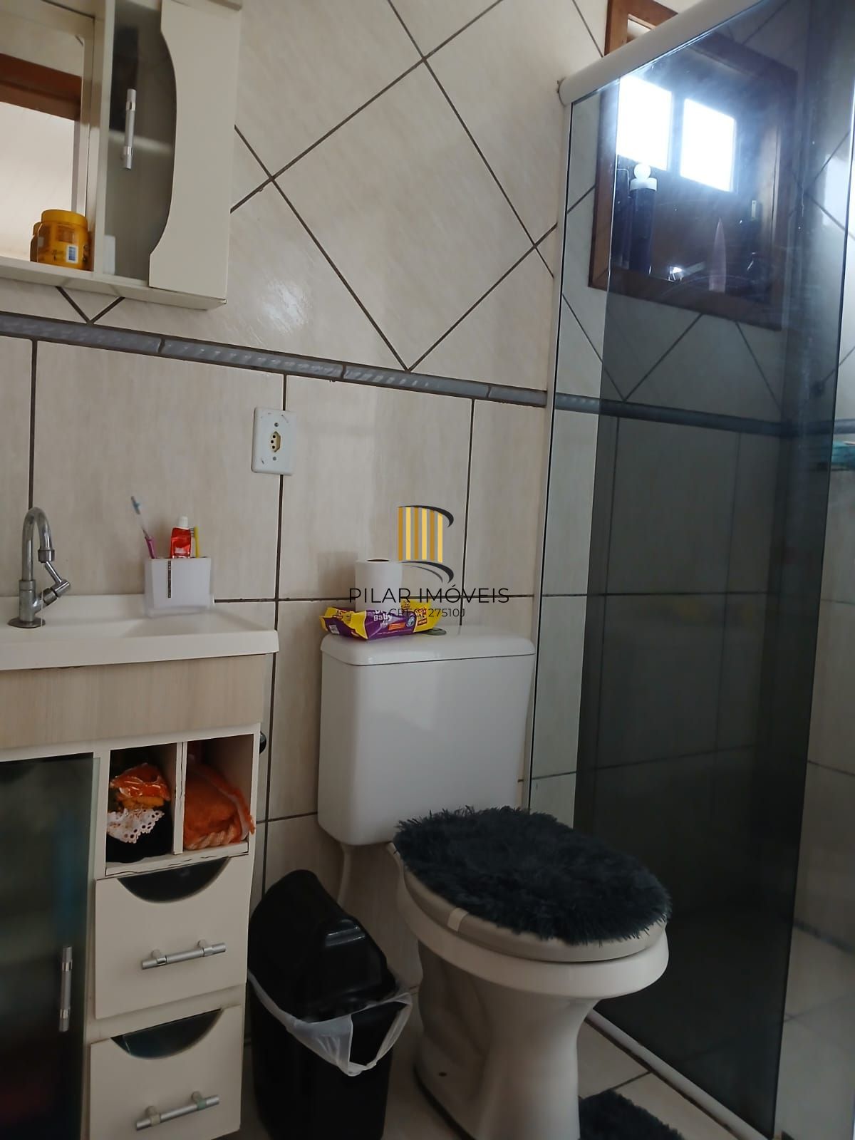 Casa de 2 dormitórios, 2 banheiros para venda no Jardim Algarve em Alvorada/RS.