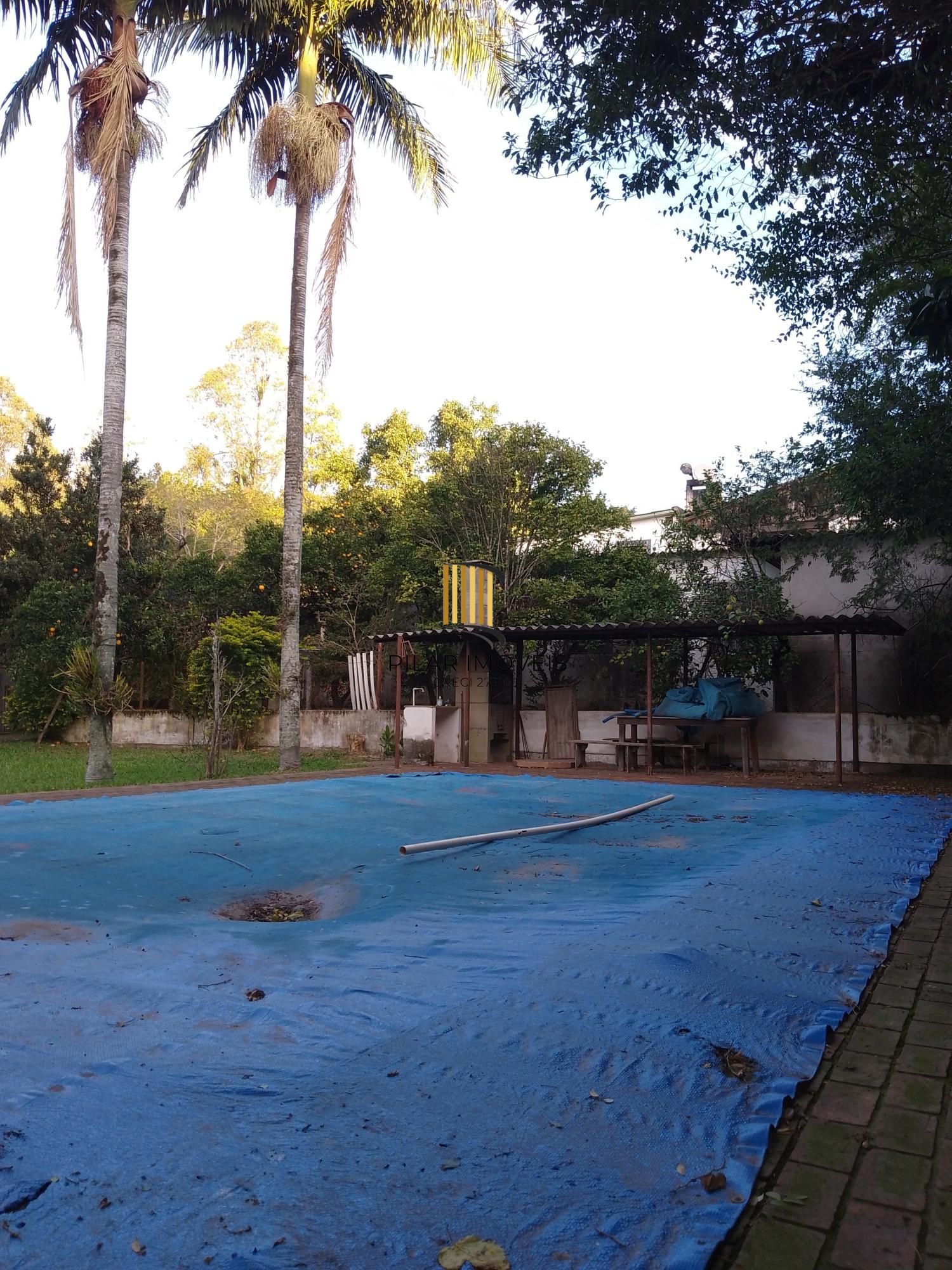Casa 4 dormitórios, terreno com 1639m² à venda no Morro Santana