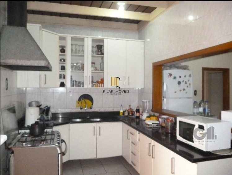 Casa 3 dormitórios no bairro Partenon