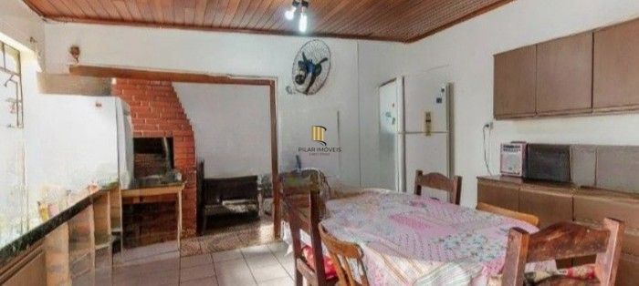 Casa 3 dormitórios no bairro Partenon