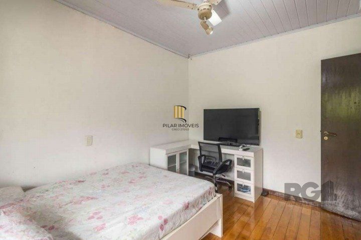 Casa 4 dormitórios no bairro Santo Antônio