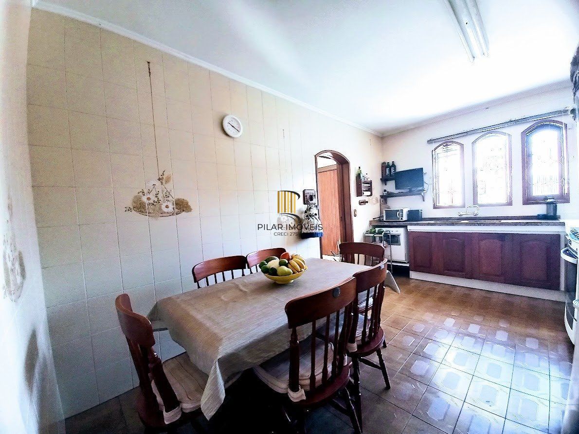 Casa 5 dormitórios no bairro Santana