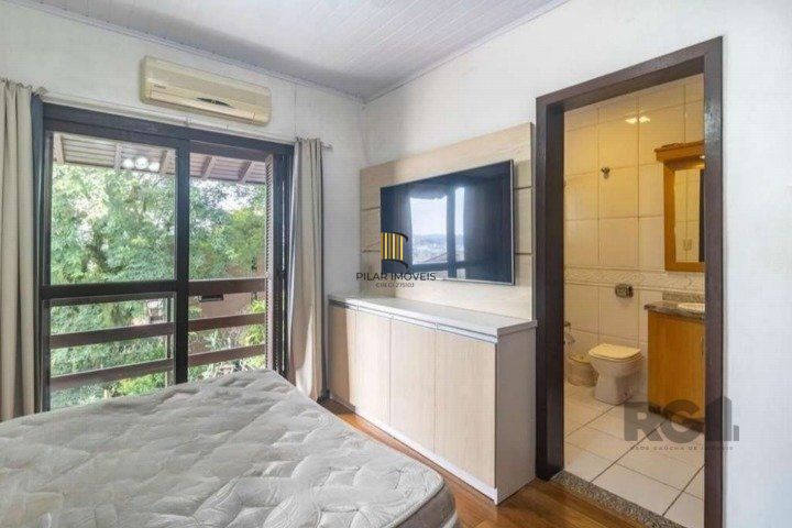 Casa 4 dormitórios no bairro Santo Antônio