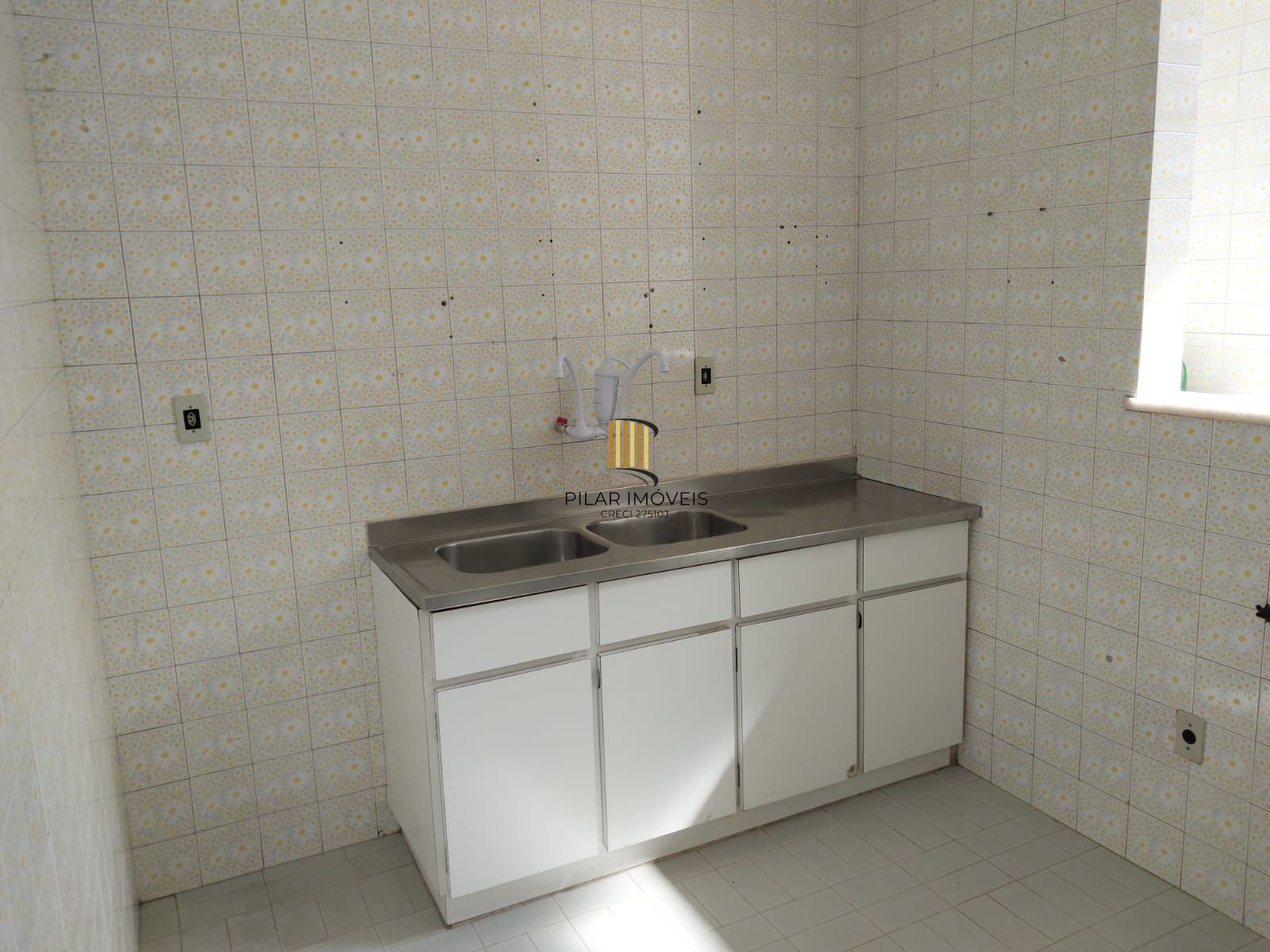 Apartamento de frente com 2 dormitórios para venda no bairro Jardim Botânico em Porto Alegre/RS.