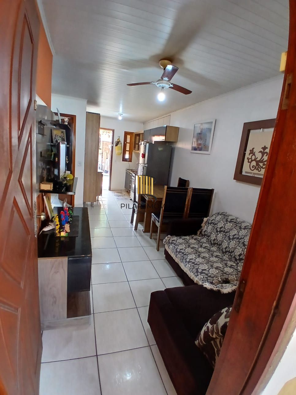 Casa de 2 dormitórios, 2 banheiros para venda no Jardim Algarve em Alvorada/RS.