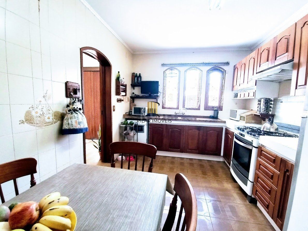 Casa 5 dormitórios no bairro Santana